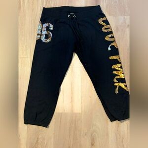 Victoria Secrets PINK 3/4 length sweatpants Size L EUC Black and gold sequined